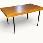 Table à manger extensible ARP Guariche Mortier Motte éditée par Minvielle vers 1960 plaqué frêne piètement métal laqué noir