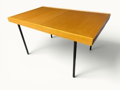 Table à manger extensible ARP Guariche Mortier Motte éditée par Minvielle vers 1960 plaqué frêne piètement métal laqué noir